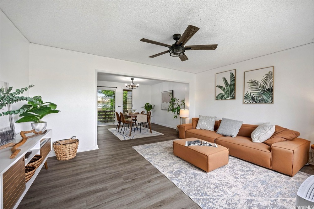 Bright living room with wood floors at 98-524 E Kamahao Pl #46, Pearl City